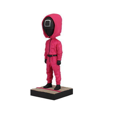 Squid Games Masked Guard Bobblehead featuring a red-suited figure with a black mask in a detailed design, showcasing its unique craftsmanship.