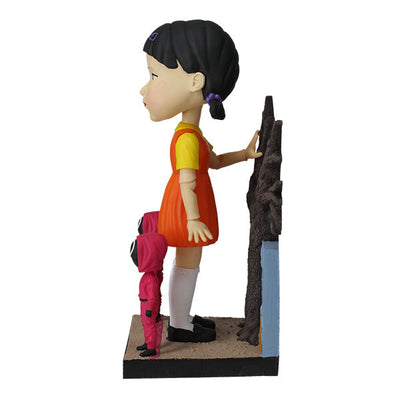 8-inch Squid Games Young-Hee Doll bobblehead displaying intricate details and vibrant colors, nodding on a sturdy base.