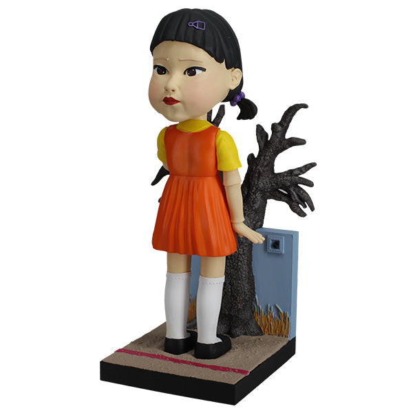 Squid Games Young-Hee Doll 10" bobblehead with detailed features and nodding action, perfect for horror collectors and fans of the series.