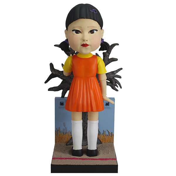 Squid Games Young-Hee Doll 10" bobblehead with detailed features and nodding action, perfect for horror collectors and fans of the series.