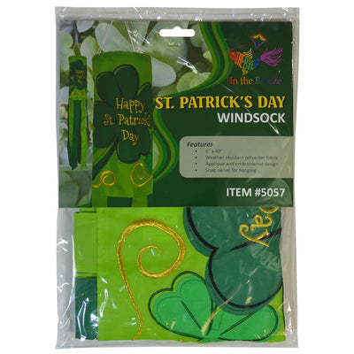 St Patrick's Day 40-inch windsock featuring vibrant four-leaf clover designs and color-coordinated tails, hanging outdoors in a garden.