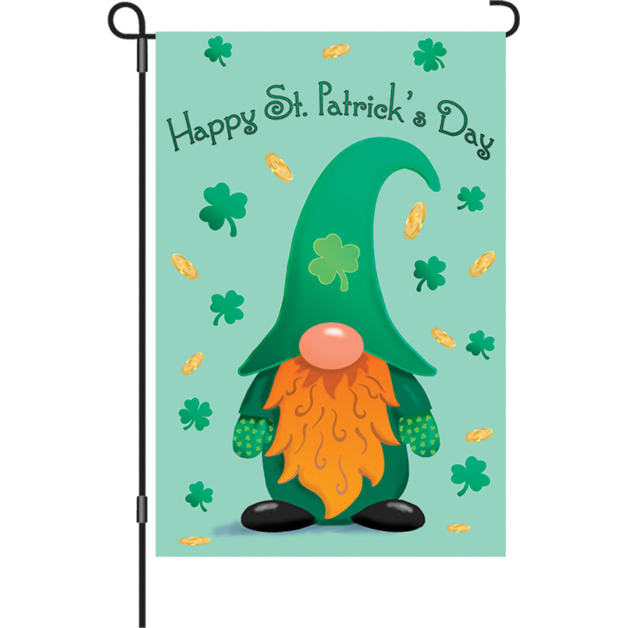 12 in. St. Patrick's Day Gnome garden flag featuring a leprechaun, shamrocks, and 'Happy St. Patrick's Day' text, displayed outdoors.