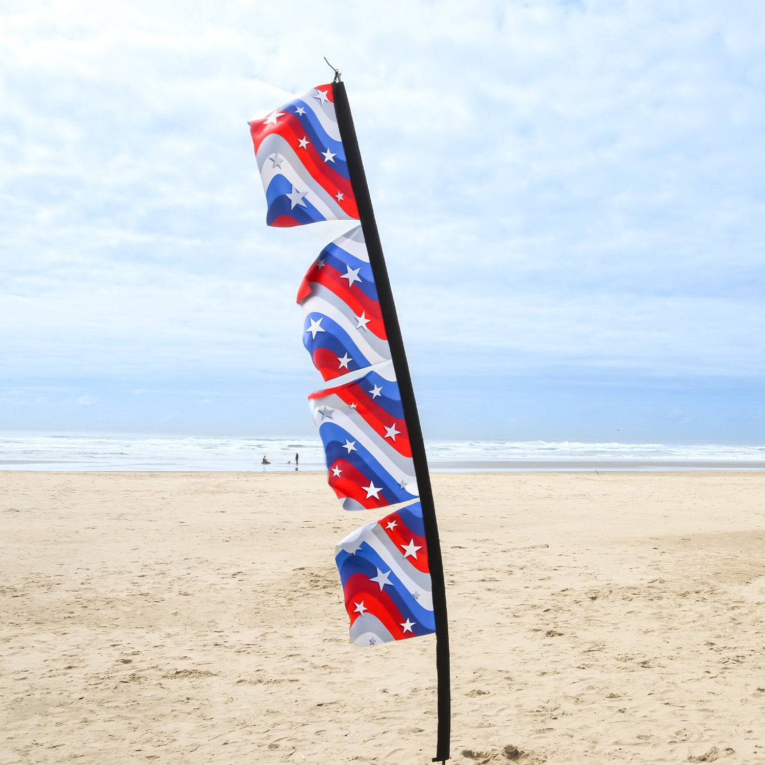Stars & Stripes 17' x 82' 4-section feather banner displayed outdoors, featuring American flag colors and details visible on both sides.
