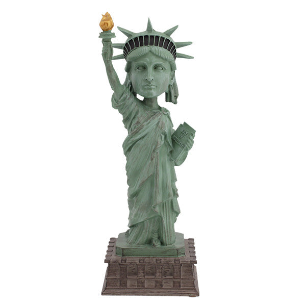 Statue of Liberty bobblehead, 8 inches tall, detailed hand-painted design capturing the iconic statue's features and colors.
