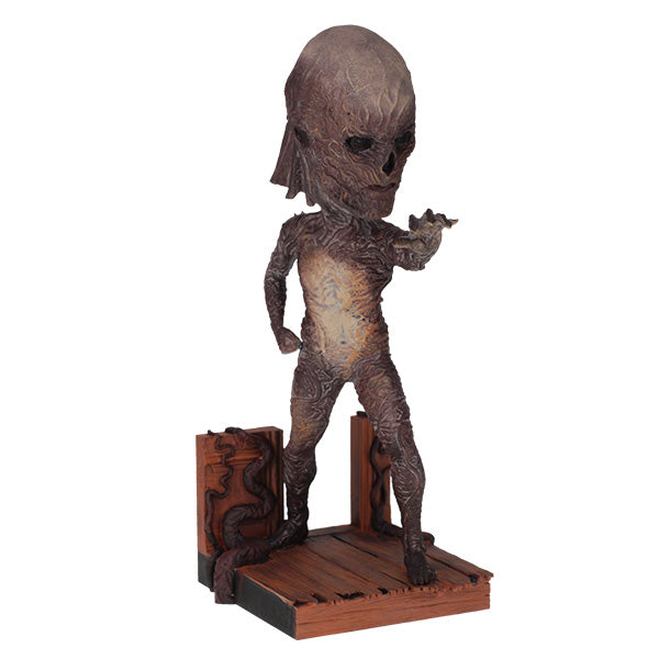 Stranger Things Vecna Bobblehead depicting the sinister villain in his eerie lair, standing approximately 8 inches tall, showcasing intricate details.
