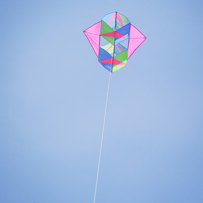 "Strike Winged Double Box Kite with vibrant design and wings displayed flying in a clear blue sky, showcasing its stability and durability.