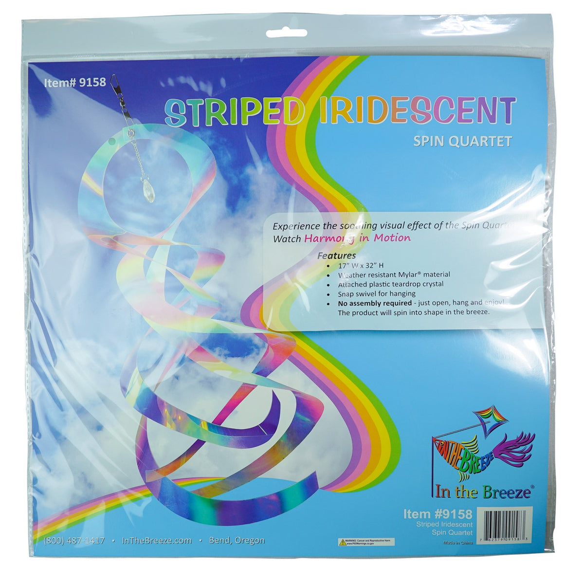 Striped Iridescent Mylar Spin Quartet displayed outside with colorful reflections and a crystal hanging from a chain, spinning elegantly in the breeze.