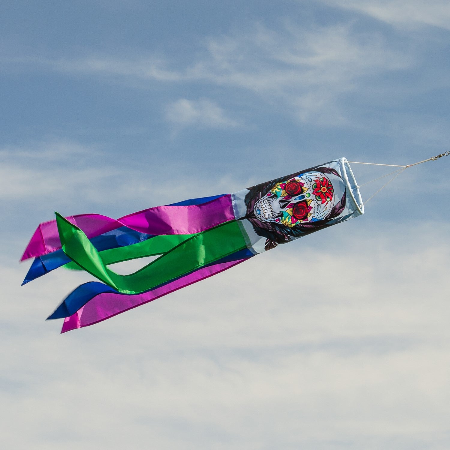 Sugar Skull 30" Windsock showcasing a colorful, intricately detailed sugar skull design swaying in the breeze, perfect for vibrant outdoor decor.