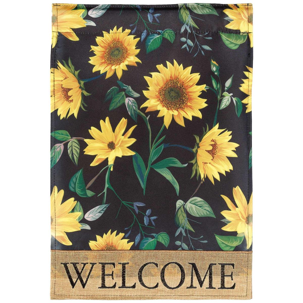 Sunflower Welcome Garden Flag with intricate appliques and embroidery displayed on a garden pole, featuring vibrant sunflower design.