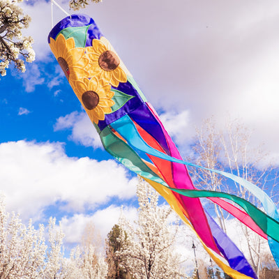 Sunflowers 40" windsock fluttering in the breeze, featuring detailed appliqued graphics and embroidered accents, bright yellow design.