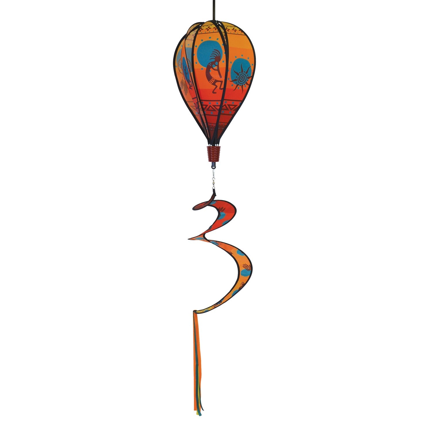 S.W. Icons 6-Panel Hot Air Balloon spinner displayed in a garden, showcasing vibrant Southwestern designs in motion as it spins in the breeze.