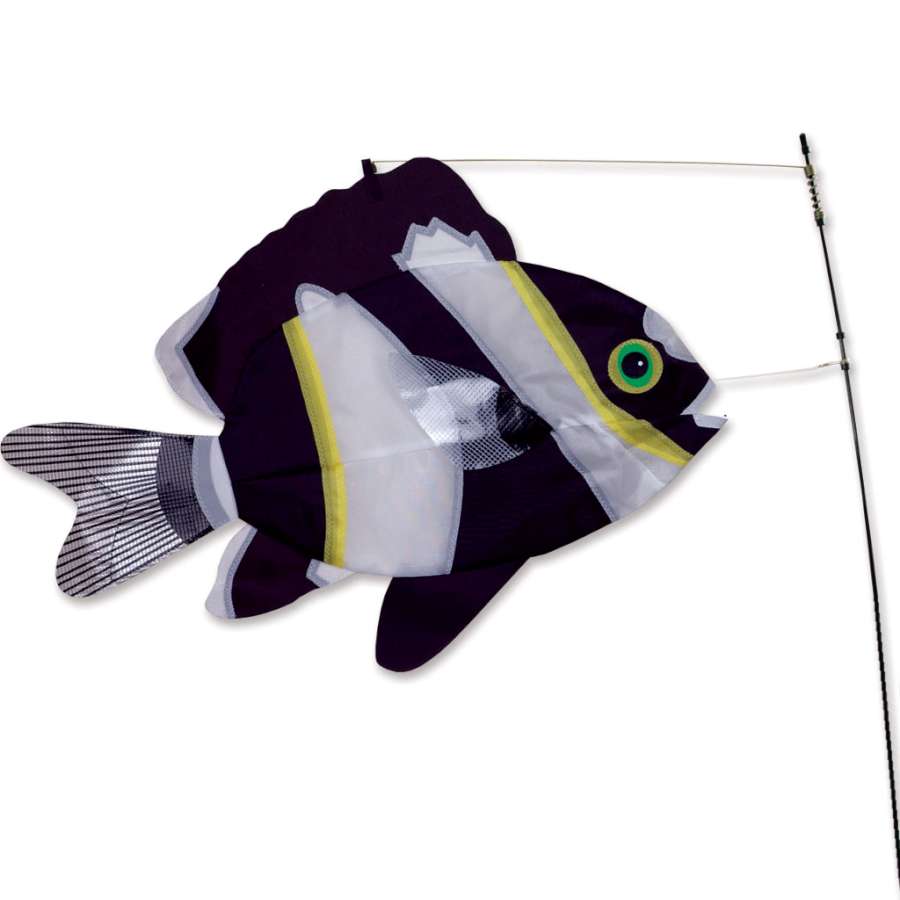 Swimming Fish - Black & White garden decoration dancing in the breeze, showcasing its playful movement in an outdoor setting.