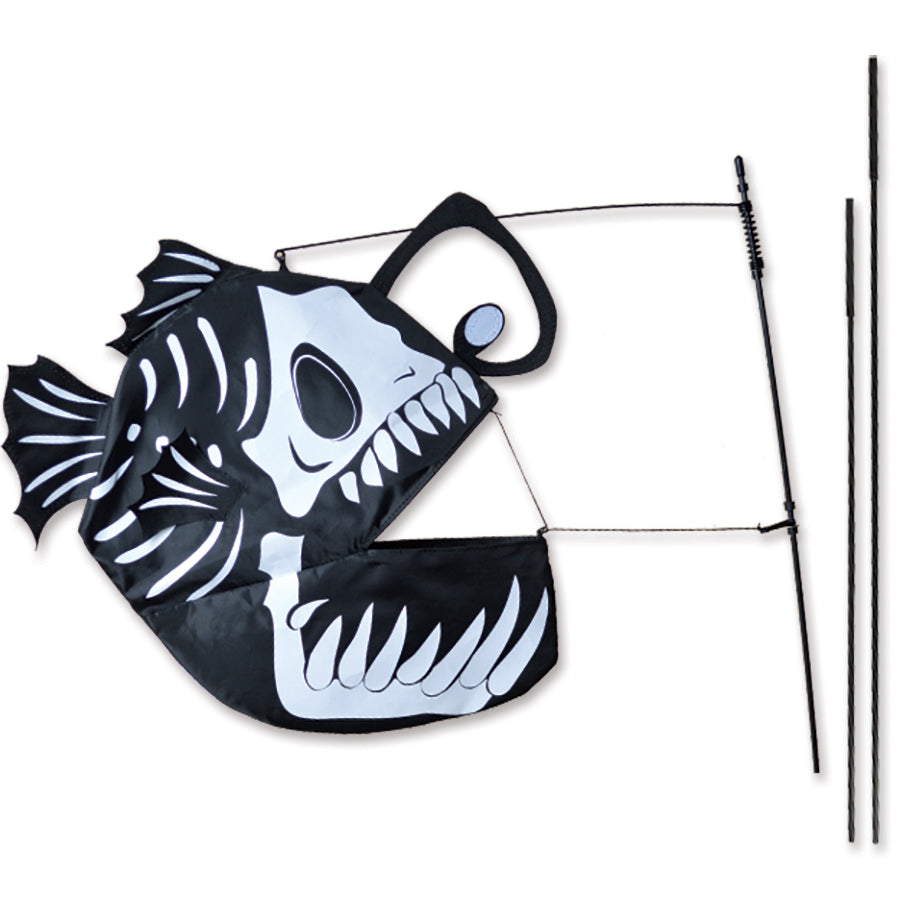 Swimming Fish Recumbent Bike Flag featuring an anglerfish design, inflating in the air to enhance visibility while mounted on a bike.