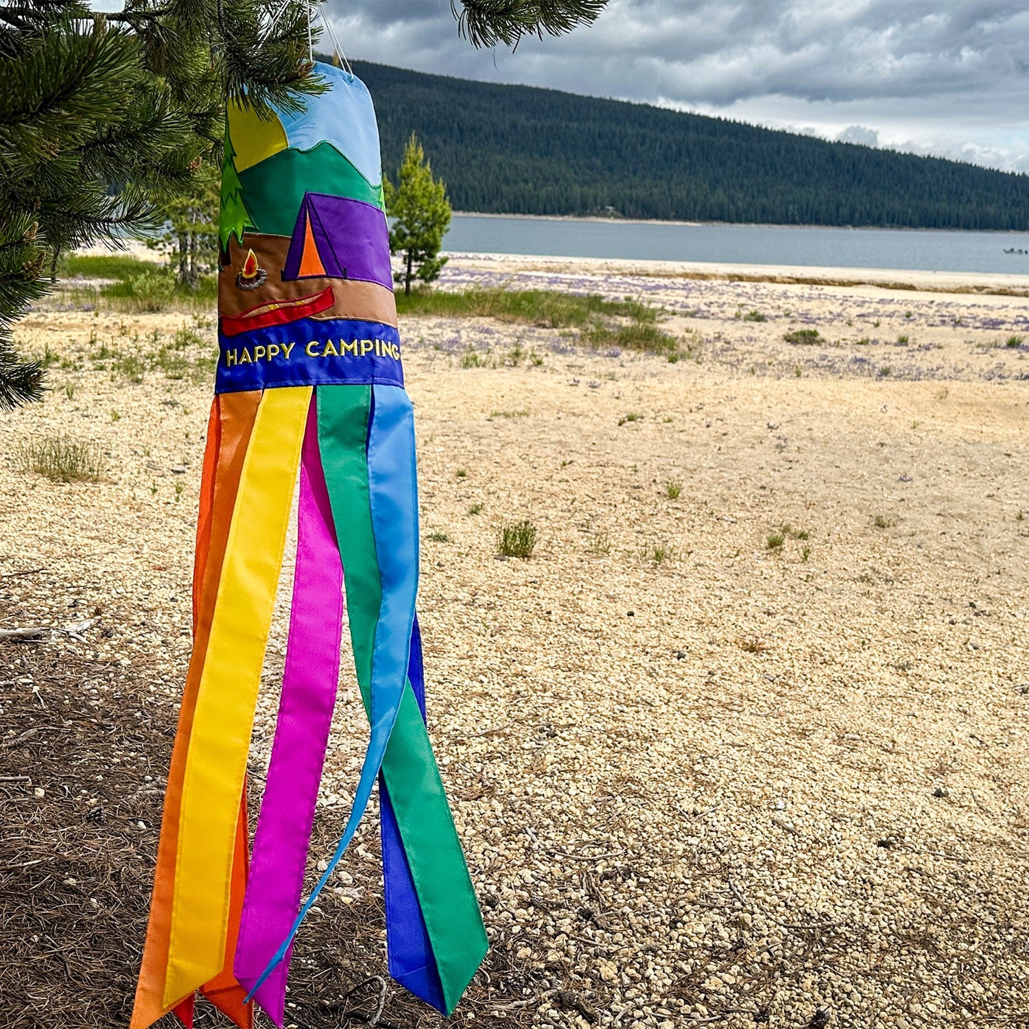 Tent Camping 40-inch windsock with colorful applique graphics and eight tails fluttering in a gentle breeze, designed for outdoor decoration.