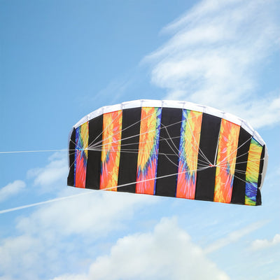 Tie Dye 62\" Sport Air Foil kite soaring in the sky, showcasing bright colors and intricate patterns against a clear blue background.