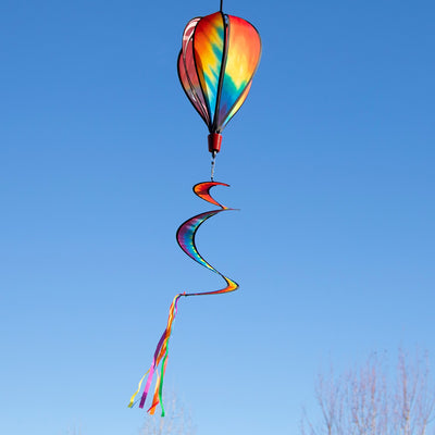 Visually stunning Tie Dye 6-Panel Hot Air Balloon spinner featuring vibrant rainbow colors and a twister tail, designed for outdoor display and easy hanging.