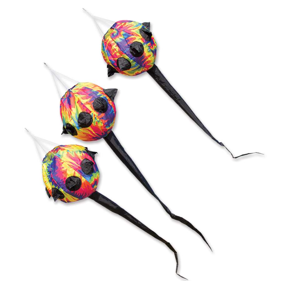 Three colorful Tie-Dye Spikey Balls displaying vibrant patterns, designed to enhance kite flying experiences outdoors.