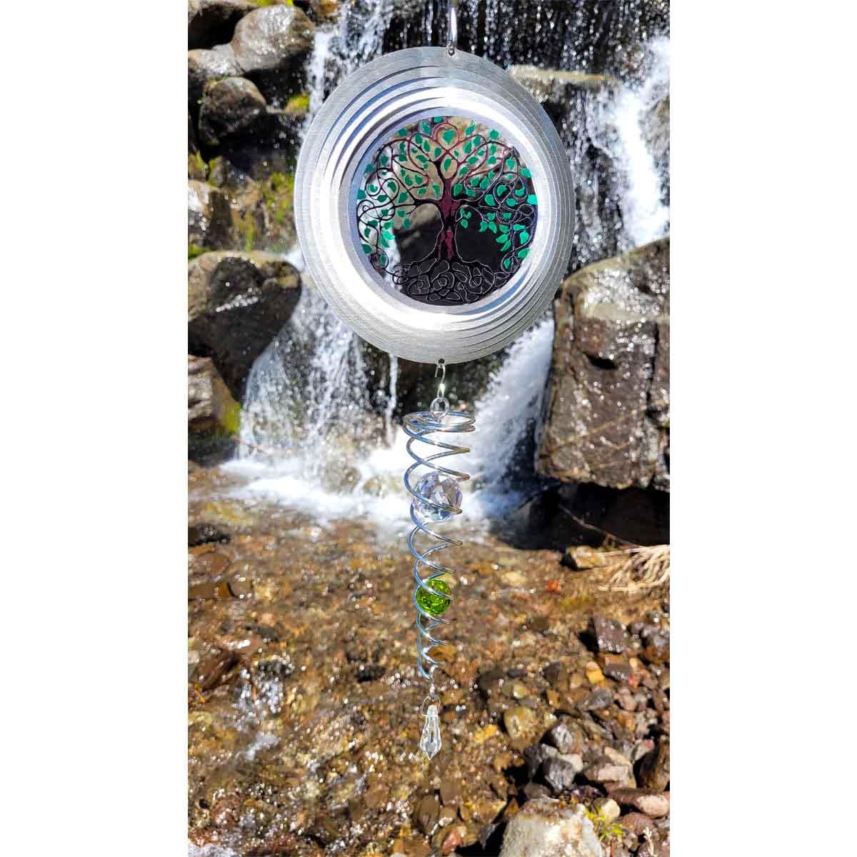 Tree of Life Mini Set Wind Spinners featuring a colorful 6.5-inch spinner and a 7.5-inch crystal twister displayed outdoors, gently spinning in the breeze.