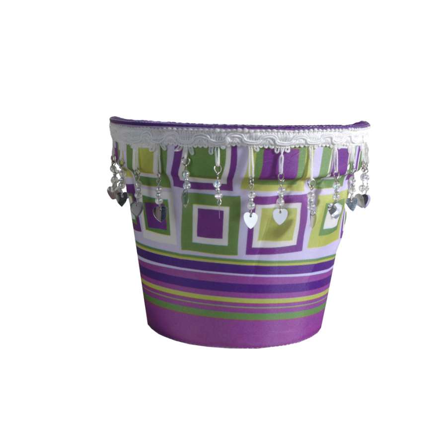 Trendi Confetti Flower Pot Cover displayed over a standard plant pot, featuring a bright and colorful confetti design in an indoor setting.