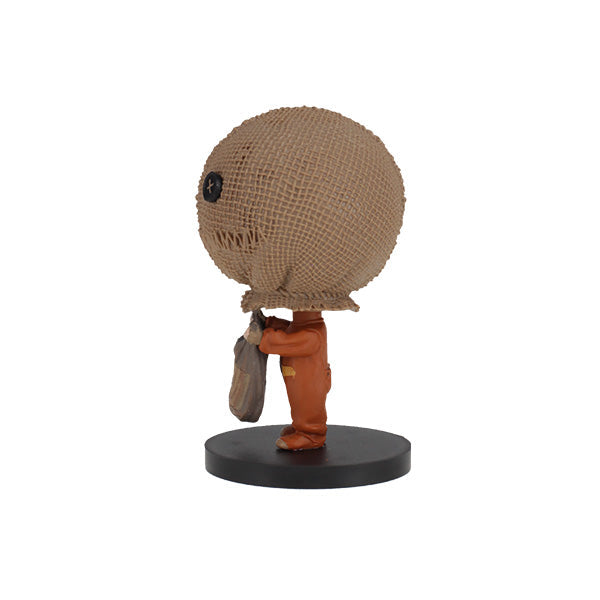 Trick 'r Treat - Sam Go! Bobbles, 3-inch tall bobblehead featuring Sam in burlap mask with treat bag, displayed in a window box.