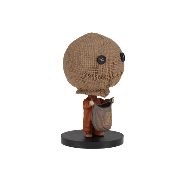 Trick 'r Treat - Sam Go! Bobbles, 3-inch tall bobblehead featuring Sam in burlap mask with treat bag, displayed in a window box.