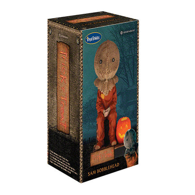 Trick 'r Treat Sam Sitting Bobblehead, a 6-inch collectible figure presenting Sam with pumpkin-like head, perfect for Halloween decor and horror enthusiasts.