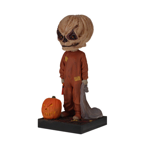 Trick 'r Treat Sam Unmasked Bobblehead standing 6 inches tall, featuring detailed craftsmanship of Sam from the Halloween classic film.