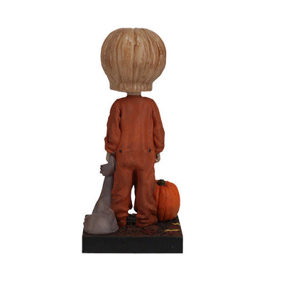 Trick 'r Treat Sam Unmasked Bobblehead standing 6 inches tall, featuring detailed craftsmanship of Sam from the Halloween classic film.