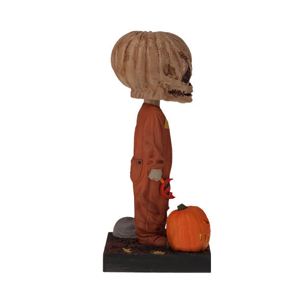 Trick 'r Treat Sam Unmasked Bobblehead standing 6 inches tall, featuring detailed craftsmanship of Sam from the Halloween classic film.
