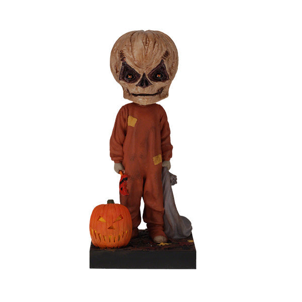 Trick 'r Treat Sam Unmasked Bobblehead standing 6 inches tall, featuring detailed craftsmanship of Sam from the Halloween classic film.