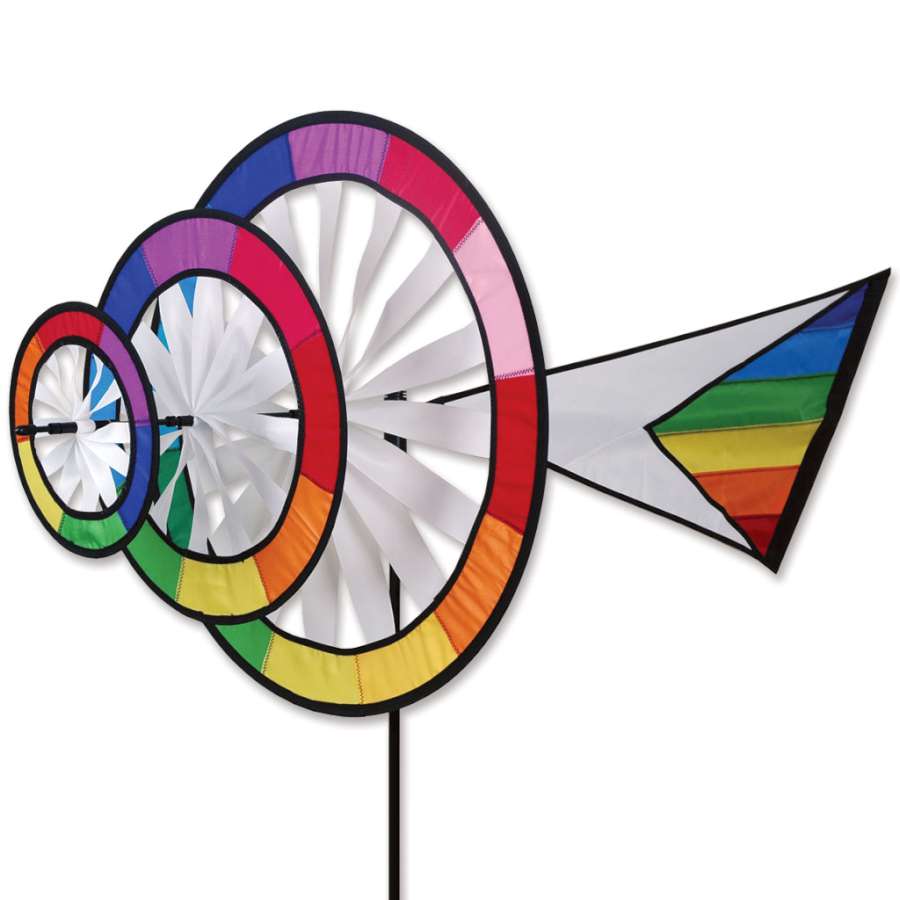 Triple Ring Spinner featuring three colorful interconnected rings rotating in the breeze, enhancing an outdoor garden space.