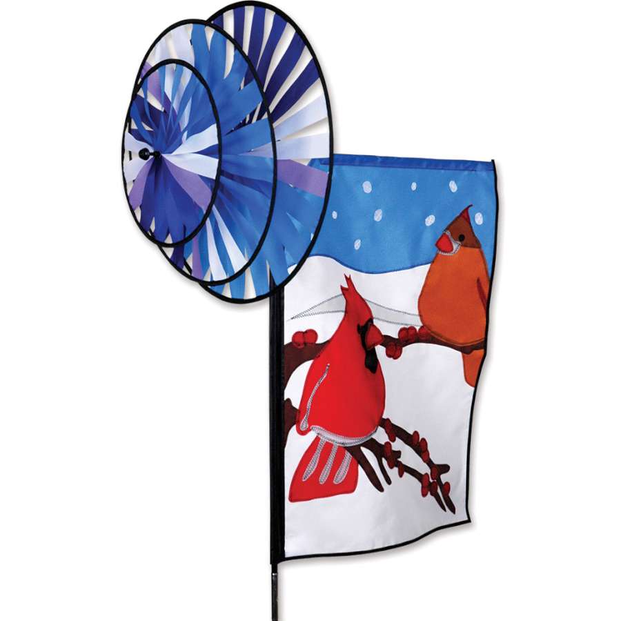 Triple Spin Banner featuring a vibrant cardinal design, spinning gracefully in a garden setting, showcasing its beauty in motion.