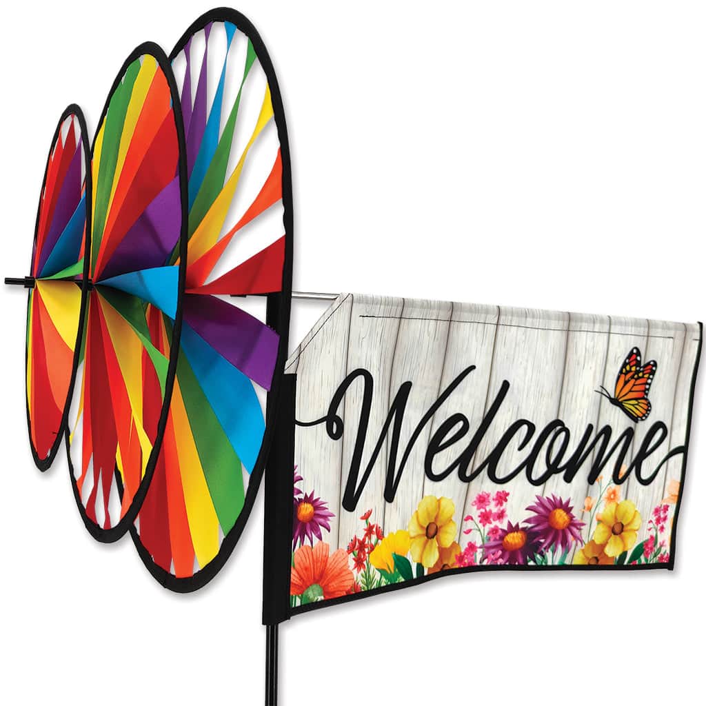 Butterfly Welcome spinner with bright wings, stitched lettering, and three spinning wheels—durable design for cheerful motion in outdoor spaces.