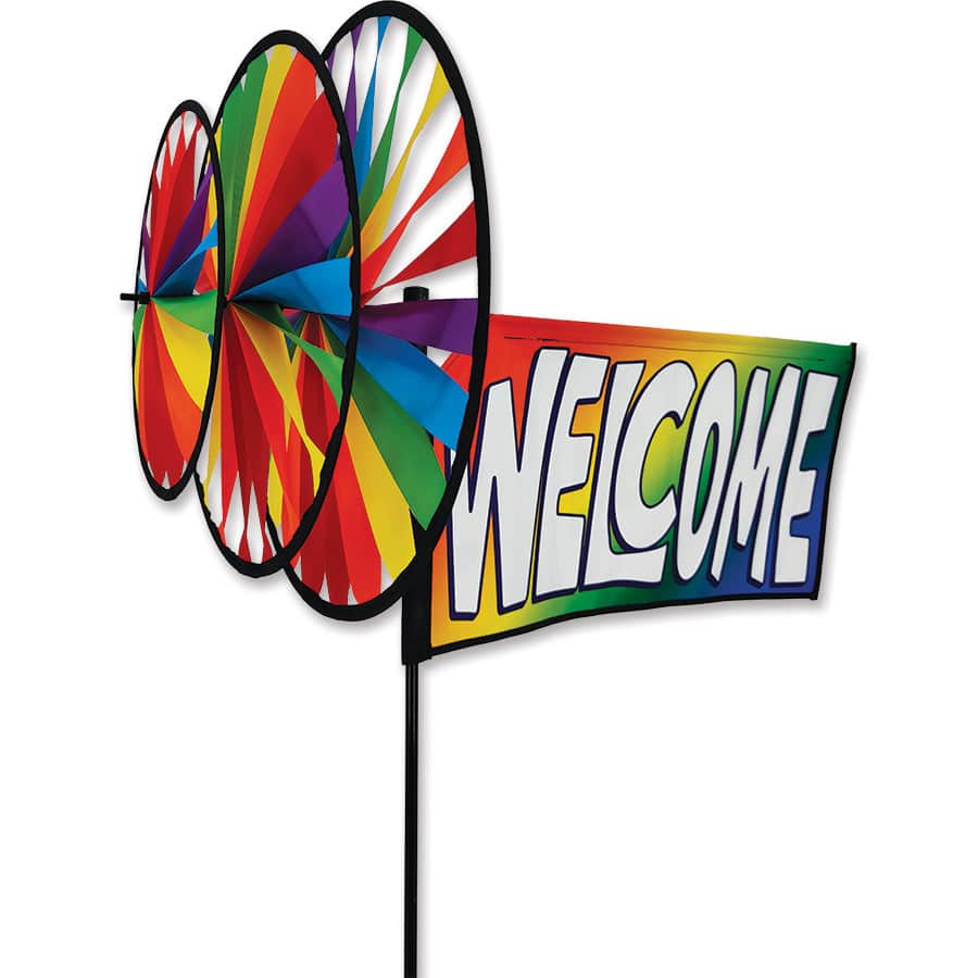 Rainbow Welcome spinner with layered wheels and stitched lettering—built for vibrant motion and outdoor durability in gardens and patios.
