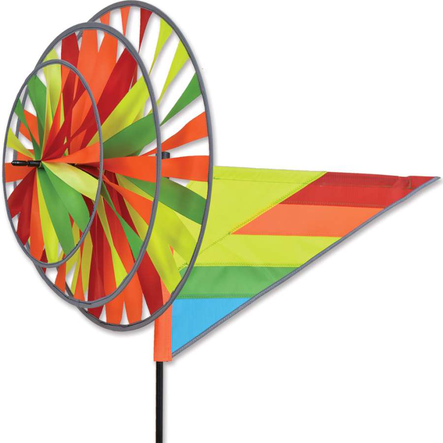 Triple Spinner - Reflective showcases vibrant, counter-rotating wheels in a garden, creating a dazzling stroboscopic effect in sunlight.
