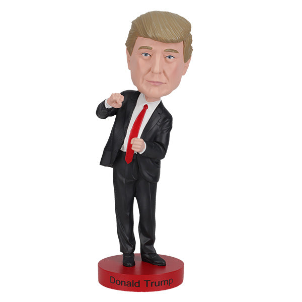Trump Dance Bobblehead displaying Donald Trump in a suit with a playful dance pose, highlighting vibrant details for political humor lovers.