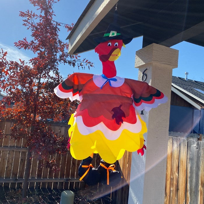 Turkey Wind Friend hangs delightfully as a 3D Thanksgiving decoration, featuring a charming turkey shape and vibrant colors for festive outdoor decor.