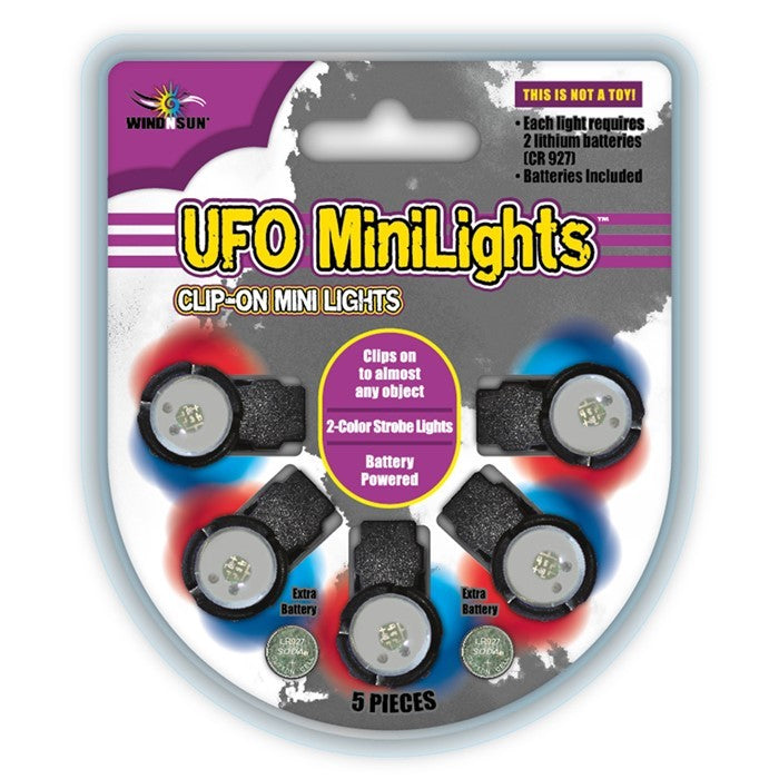 Five UFO Red/Blue LED Mini Lights with clip-on design, illuminating accessories for kites and outdoor gear in a night setting.
