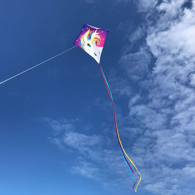The Unicorn 30" Diamond Kite features a stunning and colorful unicorn design, made from weather-resistant ripstop fabric, perfect for outdoor flying adventures.