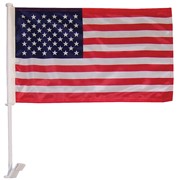 Vibrant U.S. Car Flag attached to a vehicle window, featuring the American flag design created from weather-resistant polyester fabric.