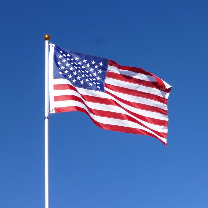 US Flag Embroidered 3x5 Grommet Flag featuring vivid red, white, and blue colors with embroidered stars displayed outdoors.