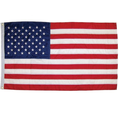 US Flag Embroidered 3x5 Grommet Flag featuring vivid red, white, and blue colors with embroidered stars displayed outdoors.