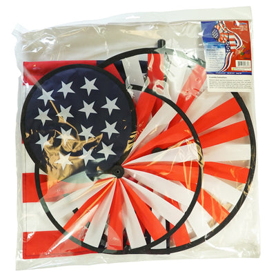 USA Flag Dual Spinner Wheels with red, white and blue design in a garden setting, featuring a garden flag and a robust pole for display.