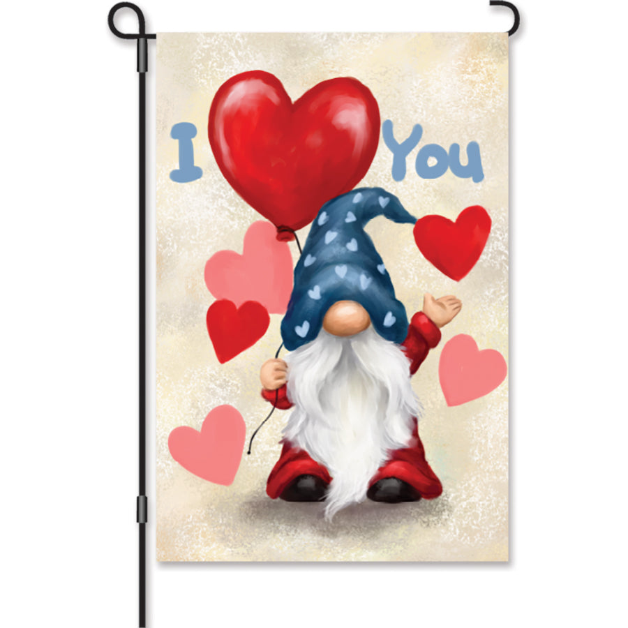 12 in. Valentine Gnome garden flag featuring a lovable gnome surrounded by hearts, with the message 'I [heart] You', displayed in outdoor settings.