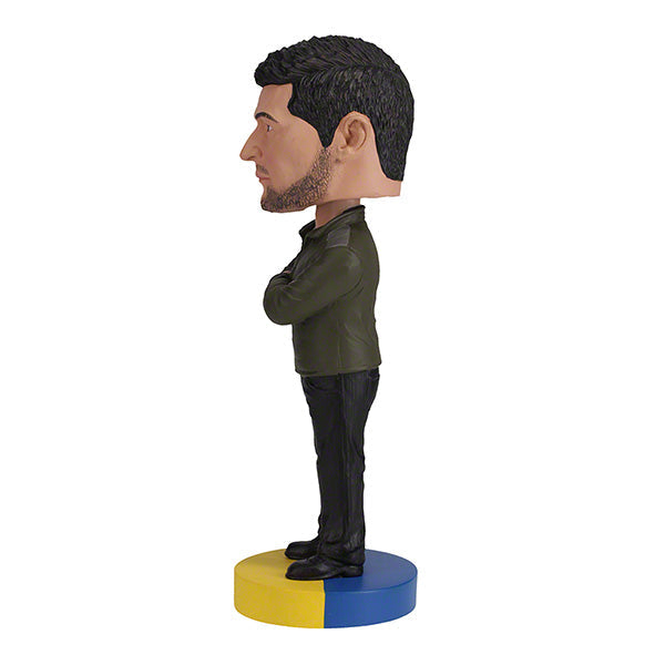 8-inch Volodymyr Zelenskyy bobblehead with authentic details and bright colors, depicting the Ukrainian president in a smiling pose.