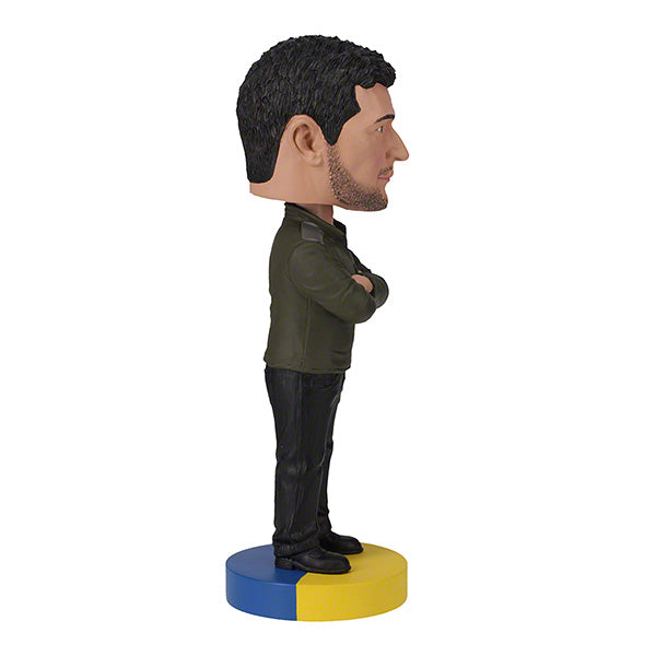 8-inch Volodymyr Zelenskyy bobblehead with authentic details and bright colors, depicting the Ukrainian president in a smiling pose.