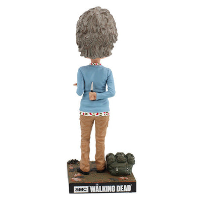 Walking Dead Carol Peletier bobblehead standing 8 inches tall, intricately hand-painted with a fierce expression and detailed outfit.