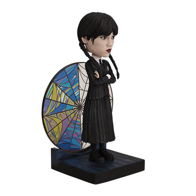 Wednesday Stained Glass Bobblehead featuring intricate colorful details, showcasing the iconic character with a decorative effect on display.