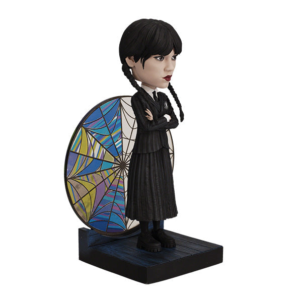 Wednesday Stained Glass Bobblehead featuring intricate colorful details, showcasing the iconic character with a decorative effect on display.