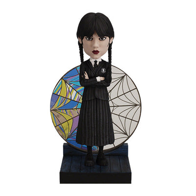 Wednesday Stained Glass Bobblehead featuring intricate colorful details, showcasing the iconic character with a decorative effect on display.